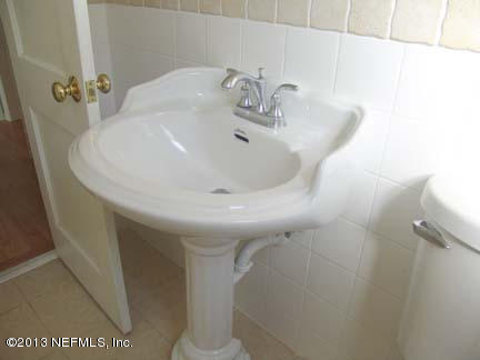 1911 Clemson Road Jacksonville, FL 32217 - Photo 19 of 26 a bathroom with a sink
