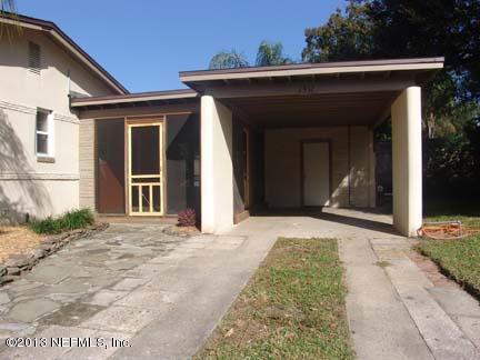 1911 Clemson Road Jacksonville, FL 32217 - Photo 2 of 26 a front view of a house with a yard