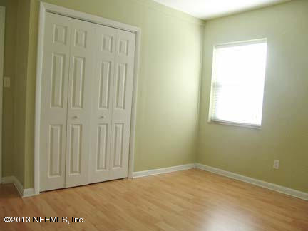 1911 Clemson Road Jacksonville, FL 32217 - Photo 23 of 26 a view of an empty room with a window