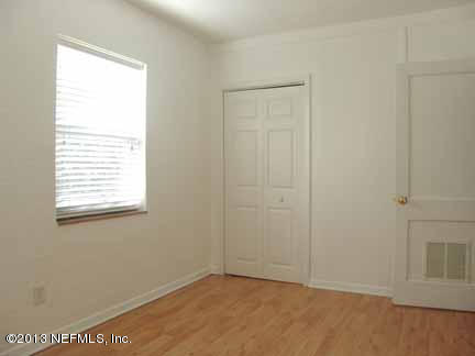 1911 Clemson Road Jacksonville, FL 32217 - Photo 25 of 26 a view of an empty room with a window