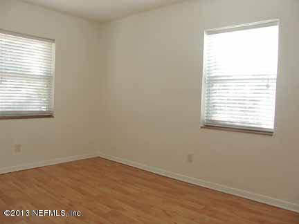 1911 Clemson Road Jacksonville, FL 32217 - Photo 26 of 26 an empty room with a window