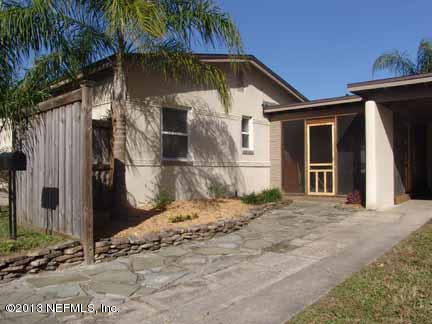 1911 Clemson Road Jacksonville, FL 32217 - Photo 3 of 26 a backyard of a house