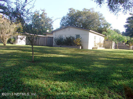 1911 Clemson Road Jacksonville, FL 32217 - Photo 7 of 26 a view of a house with a yard