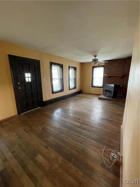 556 Jacobsburg Road Nazareth, PA 18064 - Photo 6 of 18 an empty room with windows and fireplace