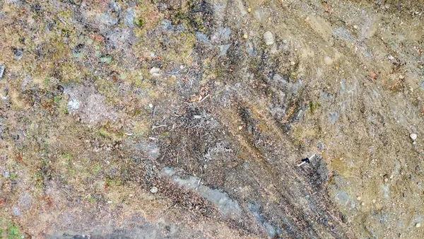 a close up of a wall with a shower