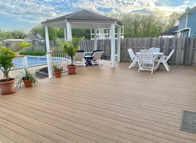 a patio with table and chairs