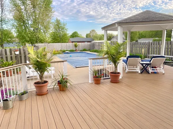 a view of a two chairs in the roof deck