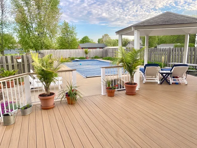 a view of a two chairs in the roof deck