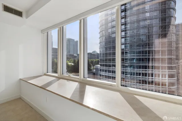 a view of a walk in closet and bedroom