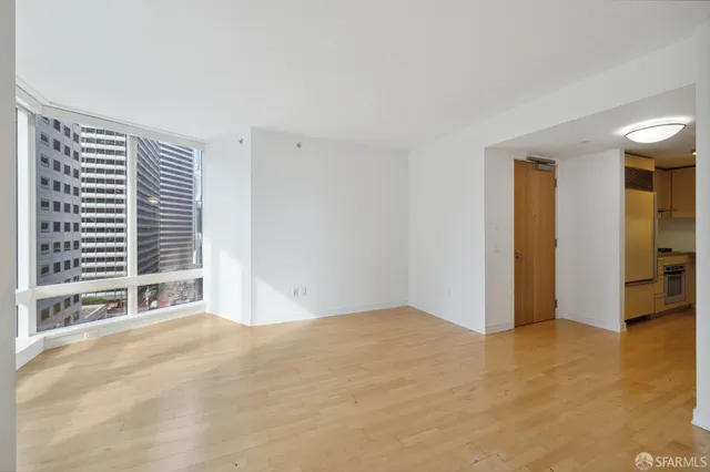 a view of an empty room with a window