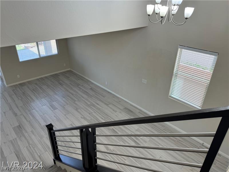 9056 Tony Ridge Avenue Las Vegas, NV 89148 - Photo 32 of 32 An open floorplan with durable flooring creates a versatile living area.
