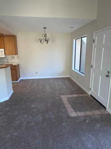 a view of a kitchen with a sink and dishwasher