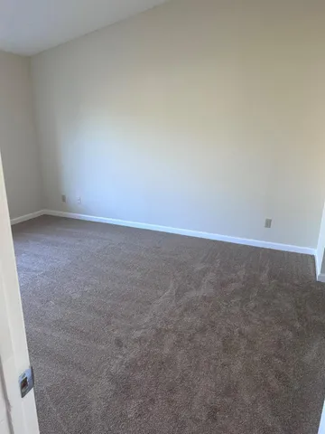an empty room with an empty room