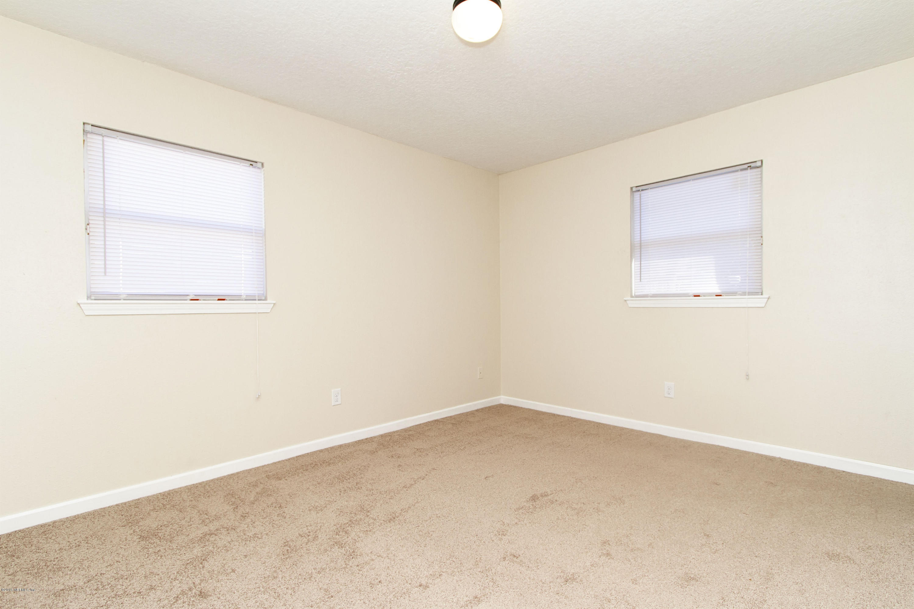 6125 Ricker Road Jacksonville, FL 32244 - Photo 13 of 18 010_Master Bedroom
