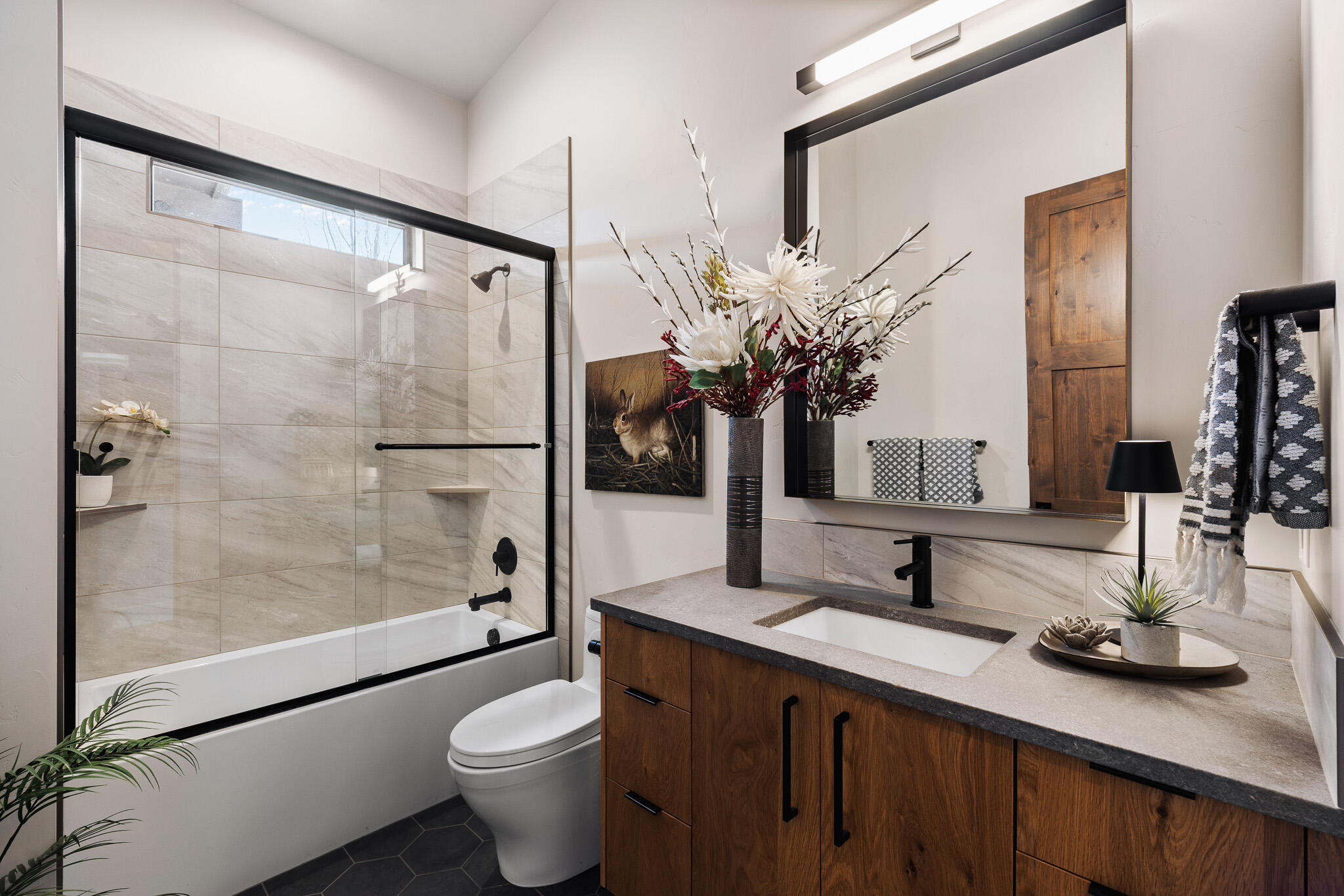22993 Ghost Tree Lane Bend, OR 97701 - Photo 24 of 35 a bathroom with a double vanity sink toilet and shower