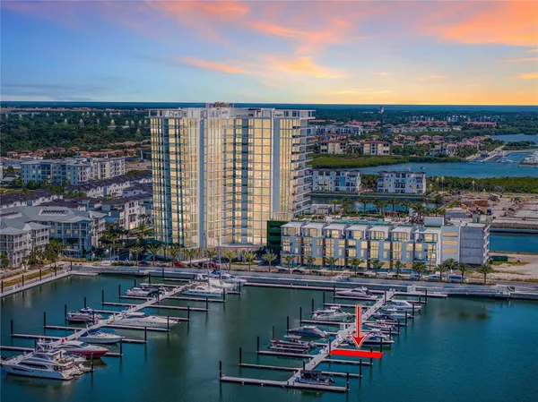 a view of a lake with tall building