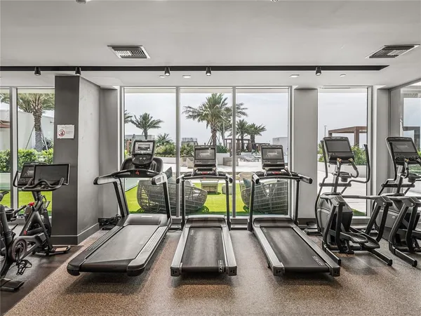 wooden floor in a hall with wooden cabinet