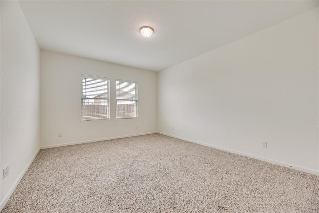 708 Peach Tree Lane Anna, TX 75409 - Photo 20 of 32 an empty room with windows