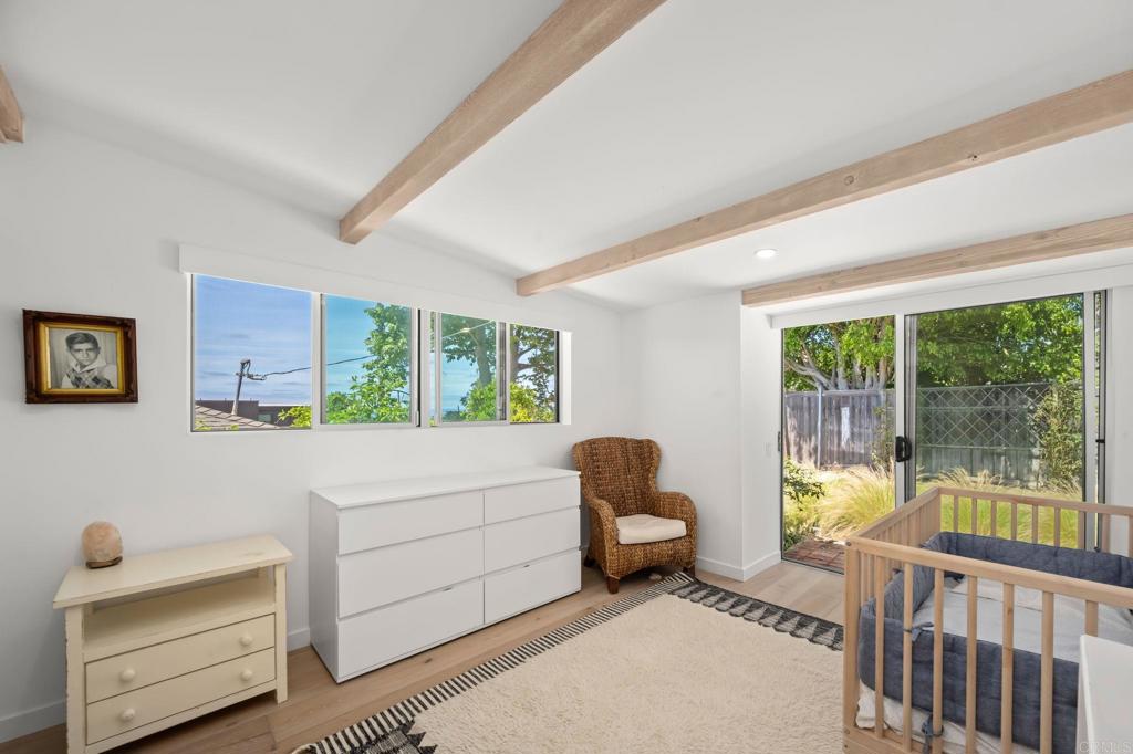 612 8th Street Del Mar, CA 92014 - Photo 10 of 12 a living room with furniture and a window