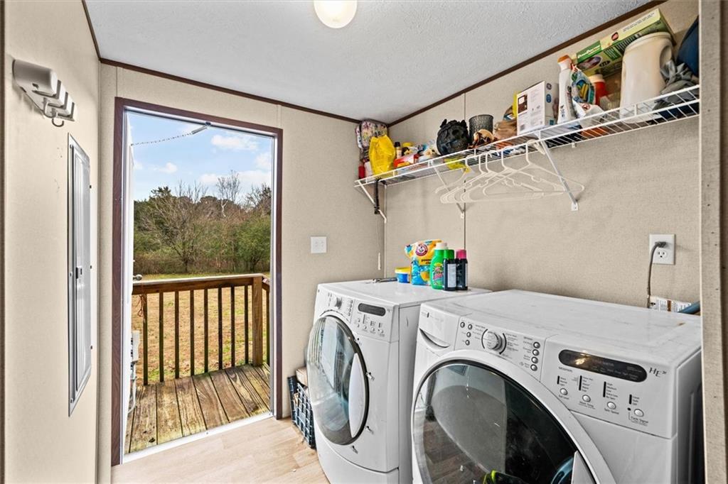 1185 Shirley Road Southeast Fairmount, GA 30139 - Photo 34 of 50 a utility room with dryer and washer