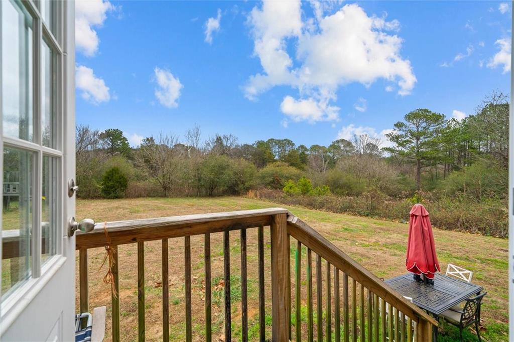 1185 Shirley Road Southeast Fairmount, GA 30139 - Photo 35 of 50 a view of a balcony with trees