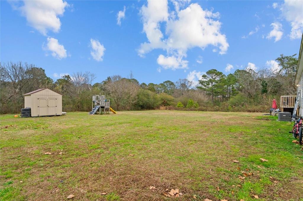 1185 Shirley Road Southeast Fairmount, GA 30139 - Photo 36 of 50 a view of an outdoor space and yard