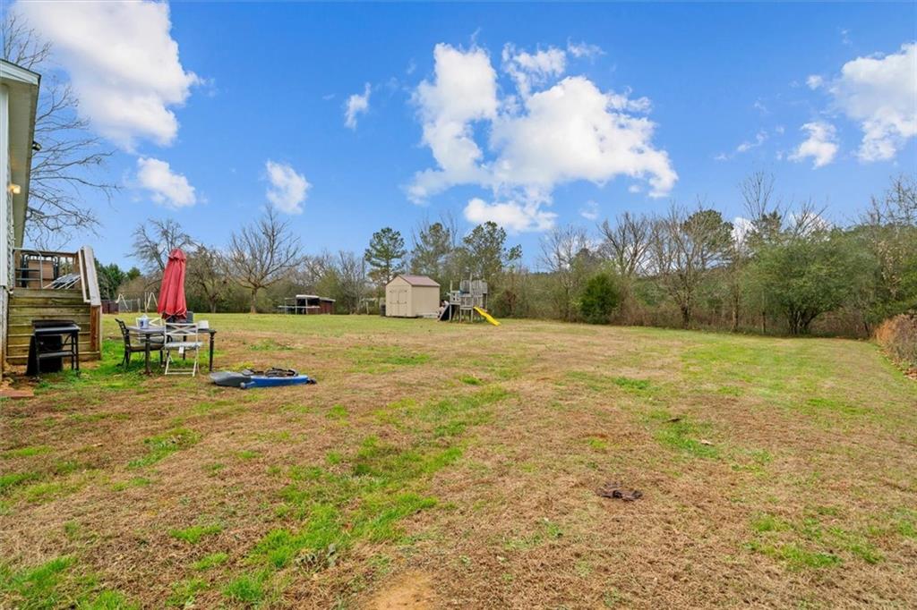 1185 Shirley Road Southeast Fairmount, GA 30139 - Photo 37 of 50 a view of a playground with basketball court