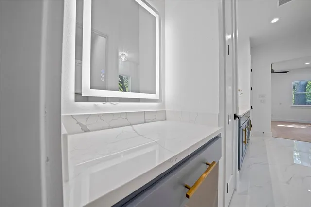 a bathroom with a sink and a bathtub