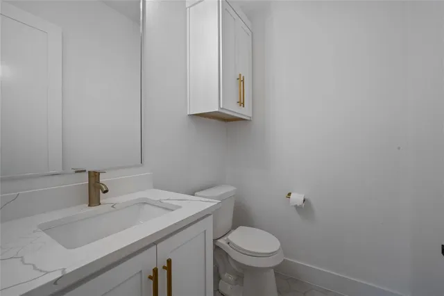a bathroom with a sink and a toilet