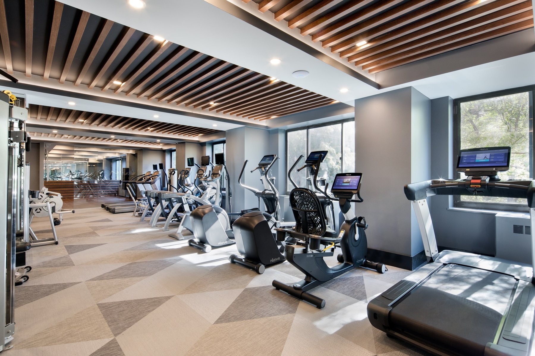 1735 York Avenue, Unit 12H Manhattan, NY 10128 - Photo 16 of 23 a view of a room with gym equipment