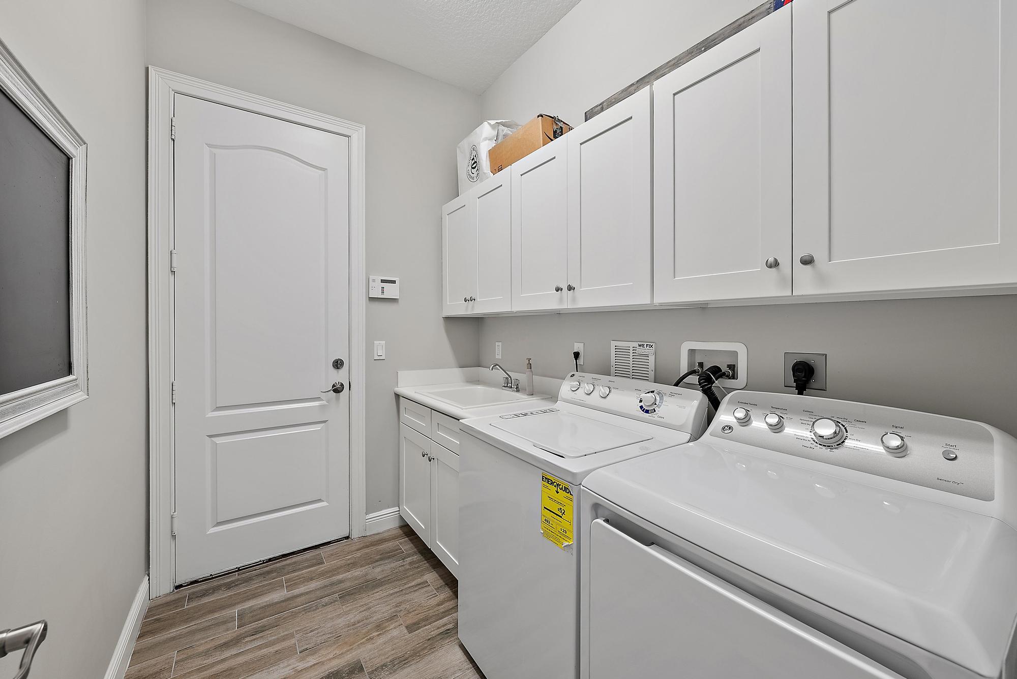 423 Rudder Cay Way Jupiter, FL 33458 - Photo 30 of 66 Laundry
