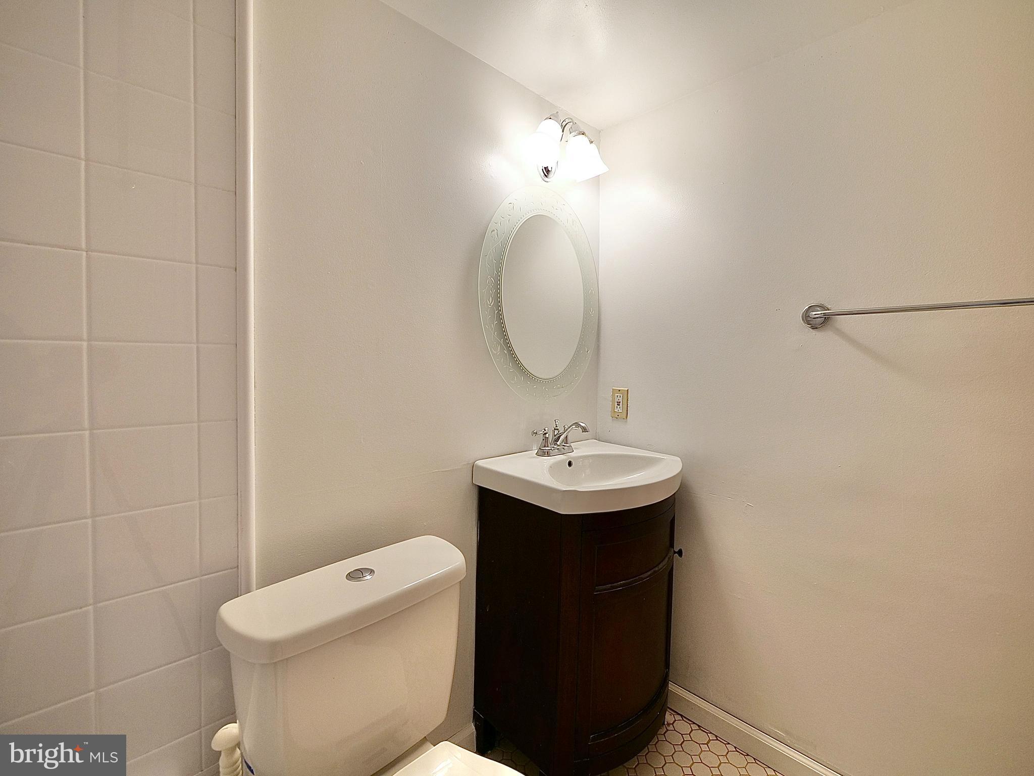 280 Bridgewater Road, Unit E8 Brookhaven, PA 19015 - Photo 23 of 33 New toilet and vanity