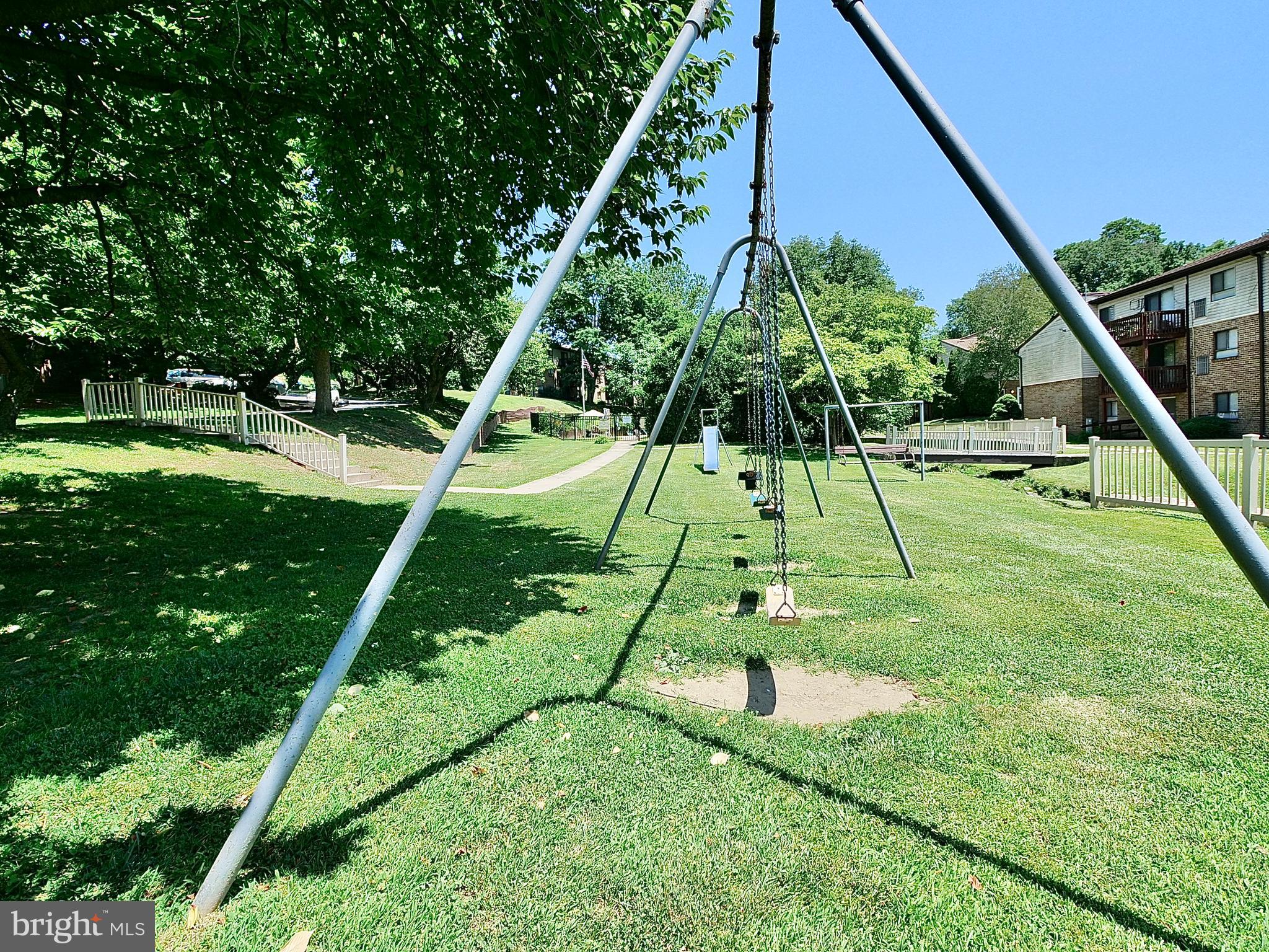 280 Bridgewater Road, Unit E8 Brookhaven, PA 19015 - Photo 28 of 33 Playground with swings