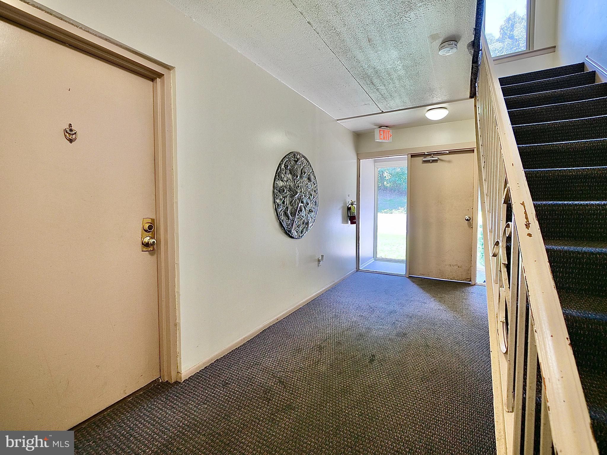 280 Bridgewater Road, Unit E8 Brookhaven, PA 19015 - Photo 7 of 33 Unit E8 door looking at entrance
