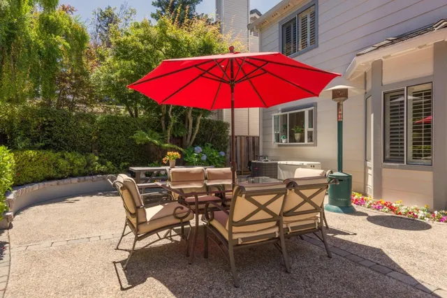 a garden view with a seating space