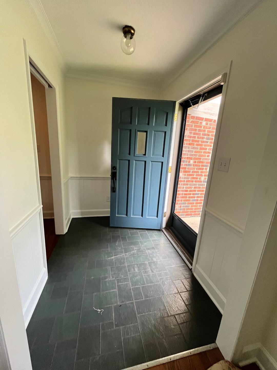 3808 Oak Park Road Raleigh, NC 27612 - Photo 4 of 19 a view of an empty room with a window
