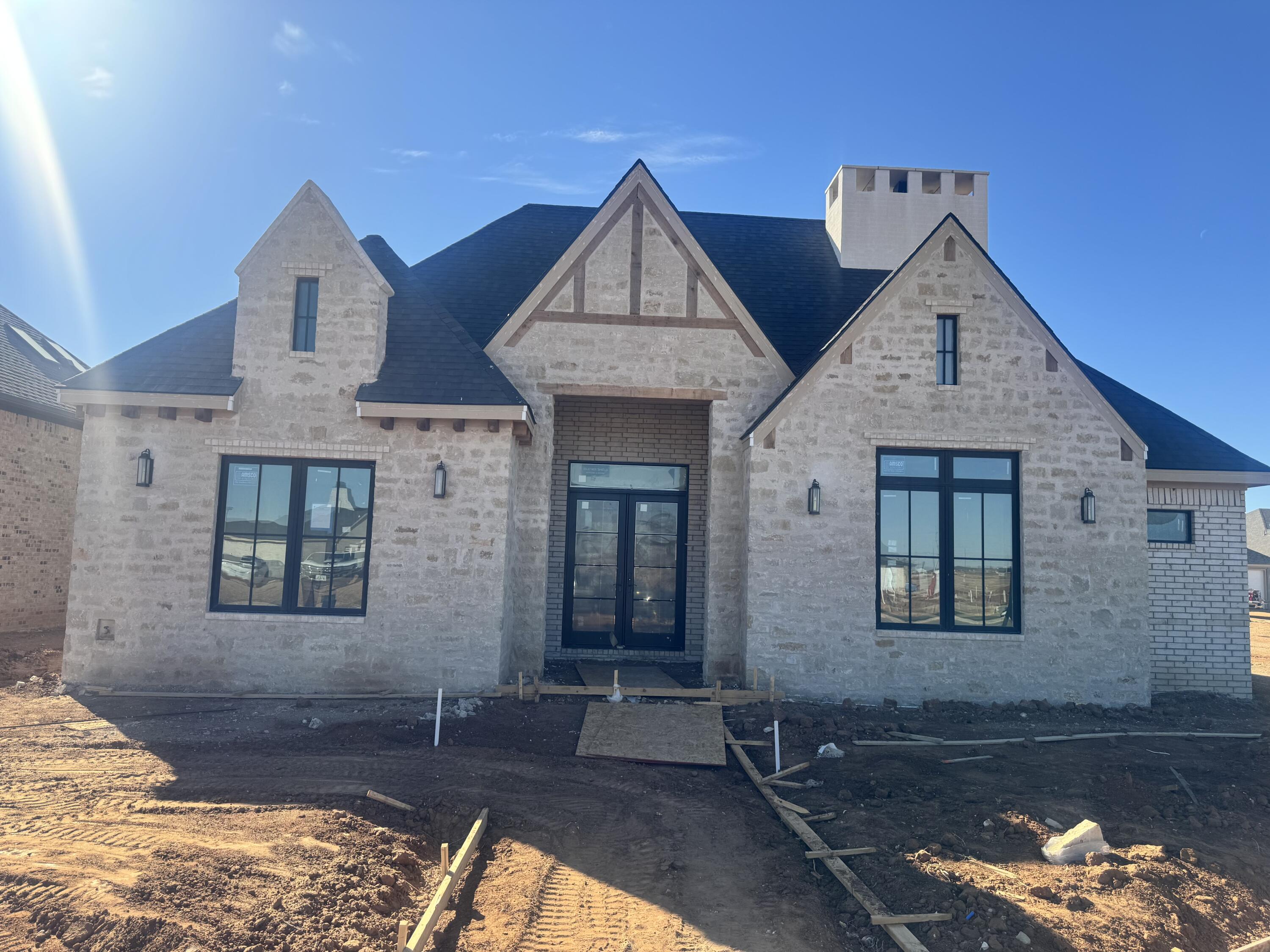 4007 150th Street Lubbock, TX 79423 - Photo 1 of 20 a front view of a house with yard