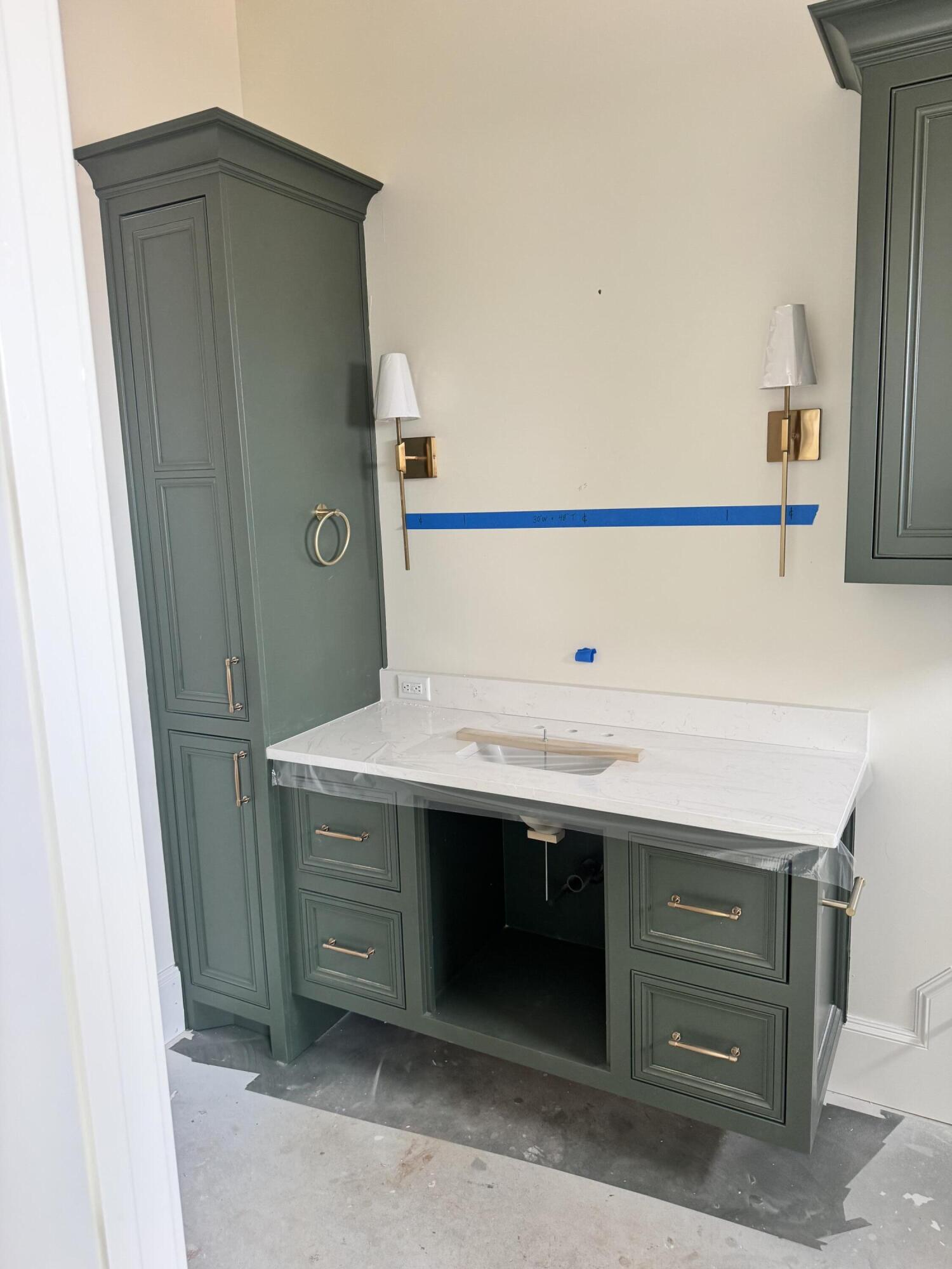 4007 150th Street Lubbock, TX 79423 - Photo 16 of 20 a bathroom with a sink and a mirror