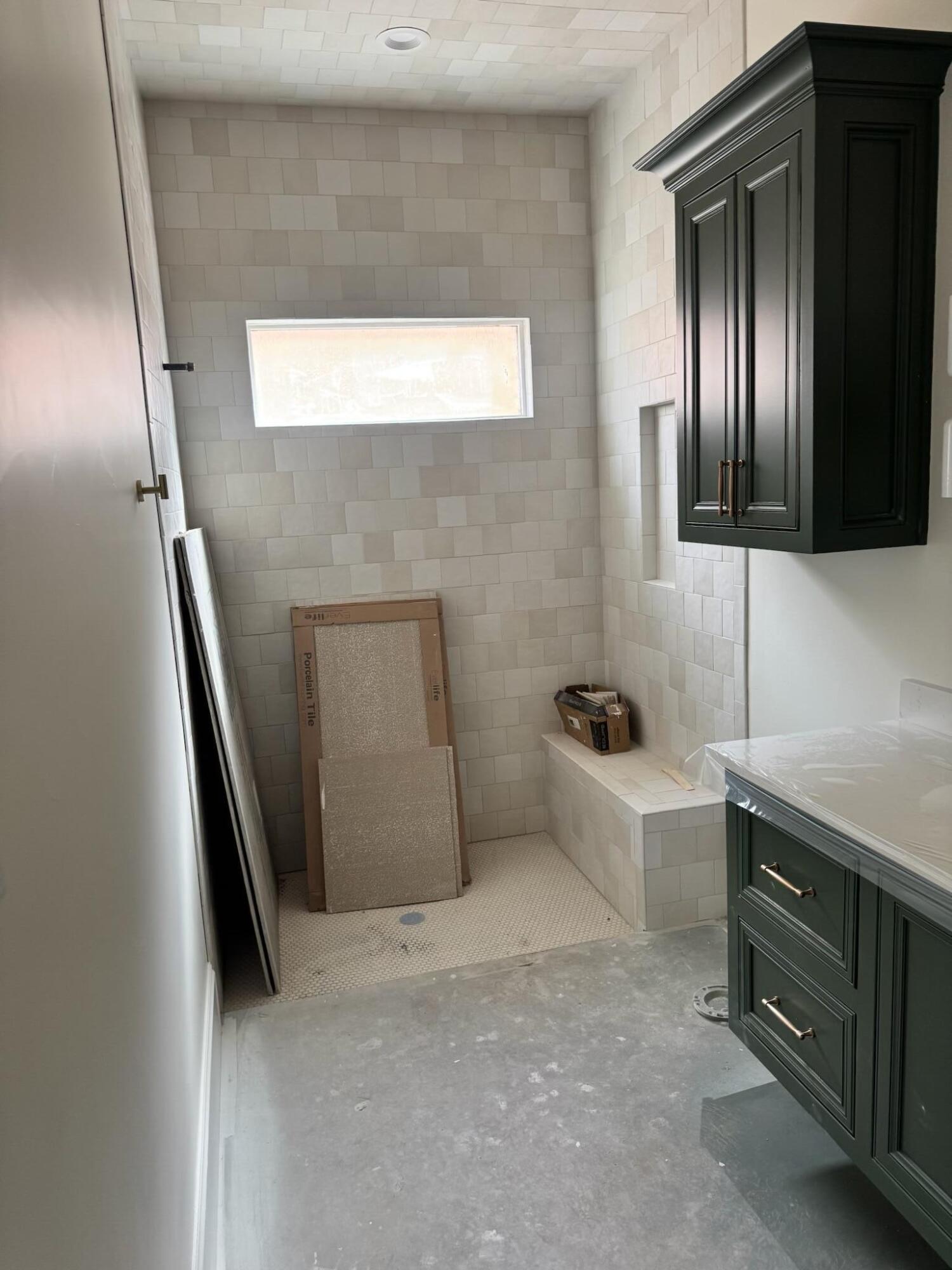 4007 150th Street Lubbock, TX 79423 - Photo 18 of 20 a bathroom with a sink and a large mirror