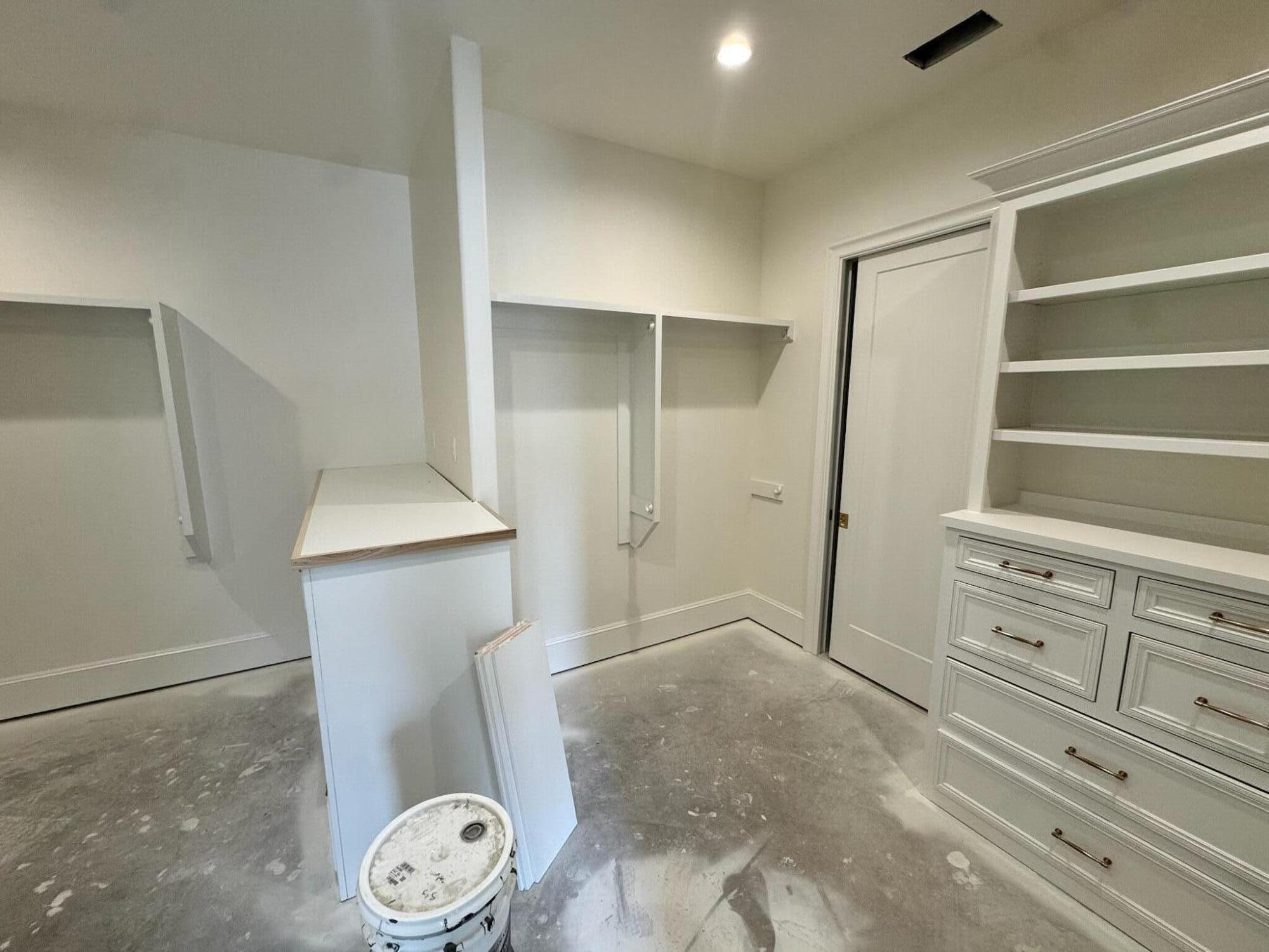 4007 150th Street Lubbock, TX 79423 - Photo 7 of 20 a view of walk in closet with empty racks