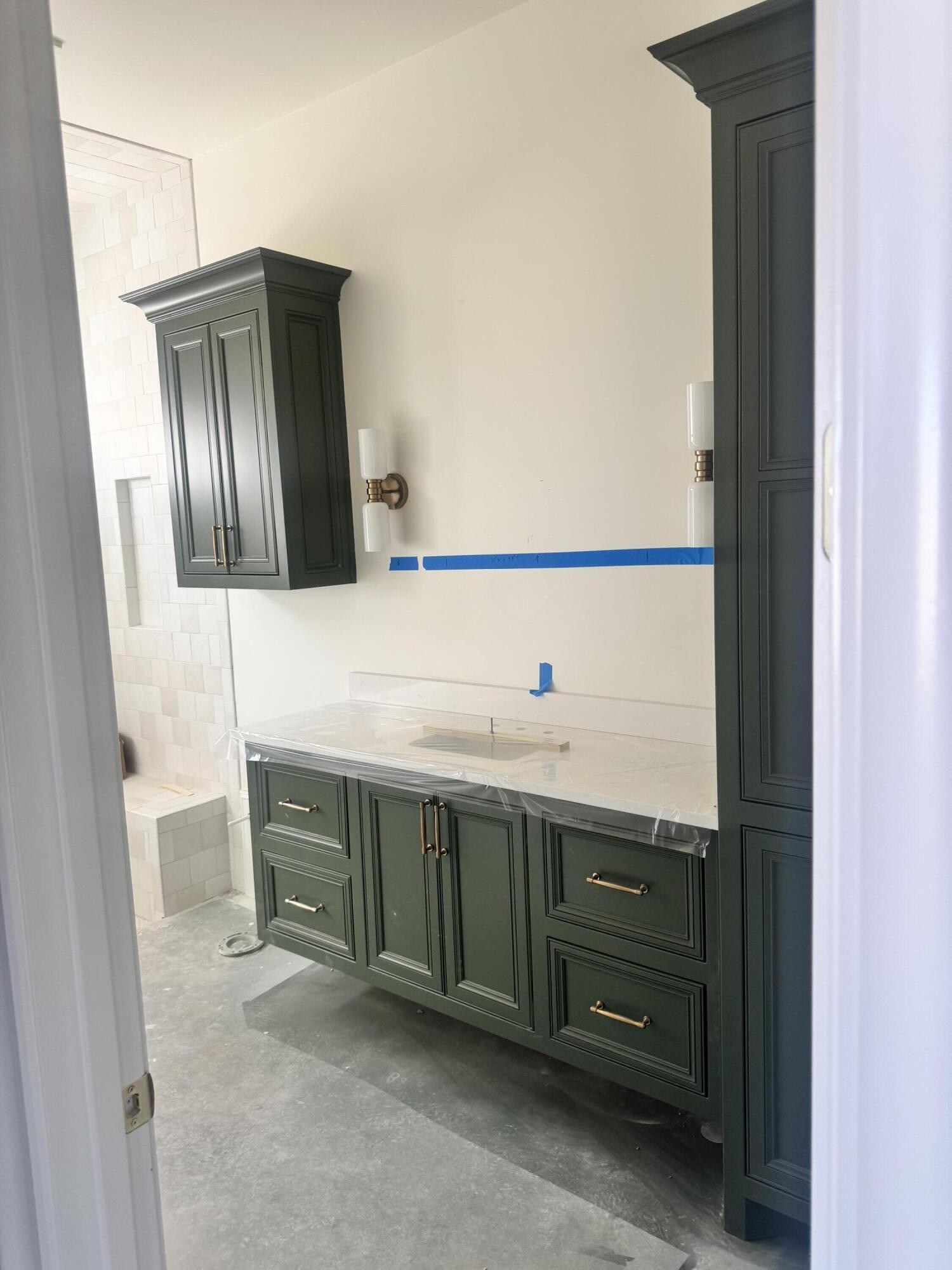 4007 150th Street Lubbock, TX 79423 - Photo 9 of 20 a bathroom with a sink and a mirror