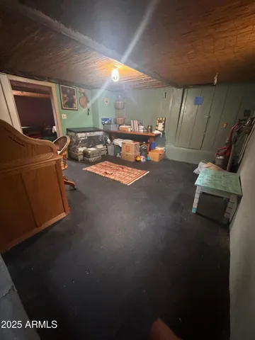 a workspace with furniture and a window