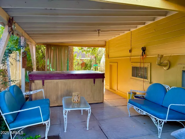 a view of a swimming pool with a patio