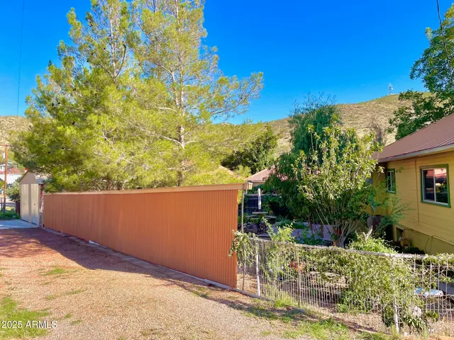 a view of balcony with furniture
