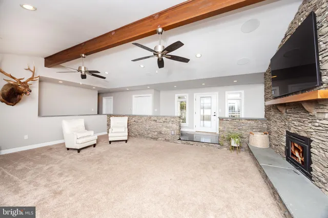 a large bathroom with a large tub and sink