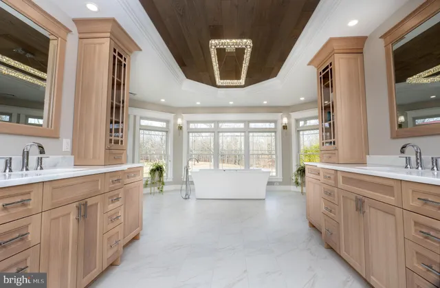 a bathroom with a shower and a sink