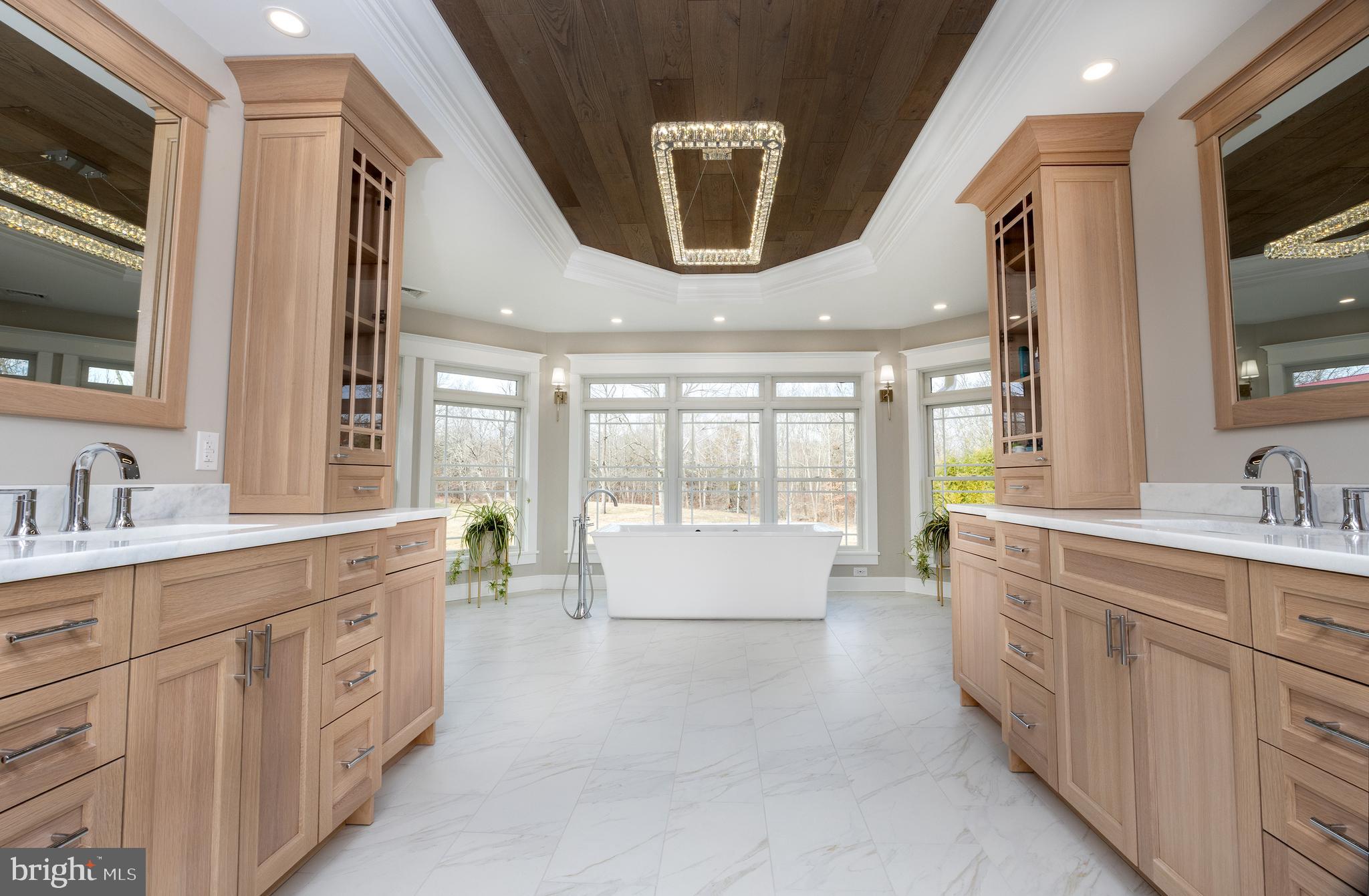 6469 Groveland Road Pipersville, PA 18947 - Photo 16 of 53 a large bathroom with a large tub and sink