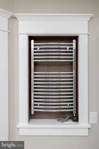 a bedroom with furniture and window