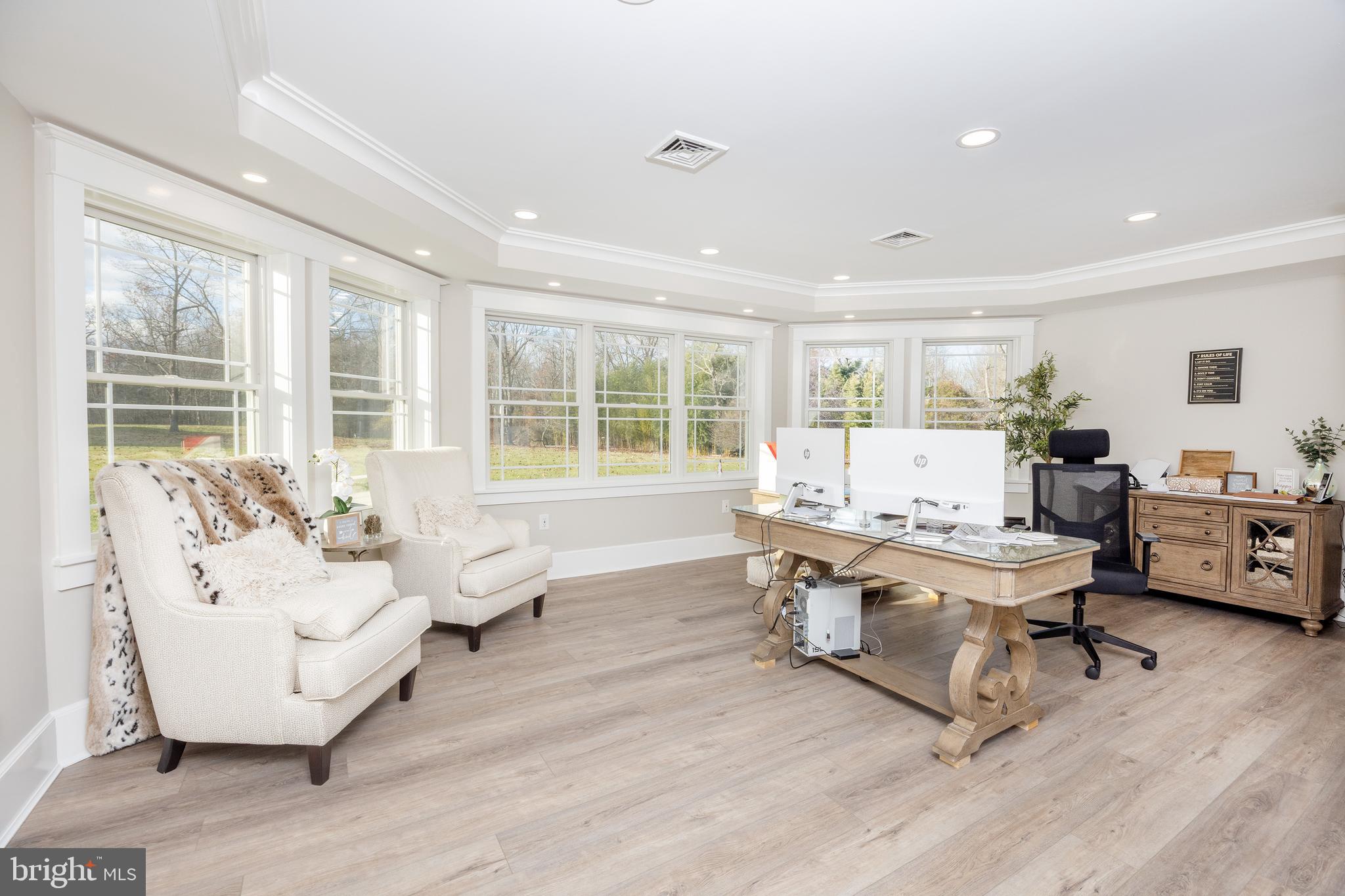 6469 Groveland Road Pipersville, PA 18947 - Photo 35 of 53 a living room with furniture and large windows