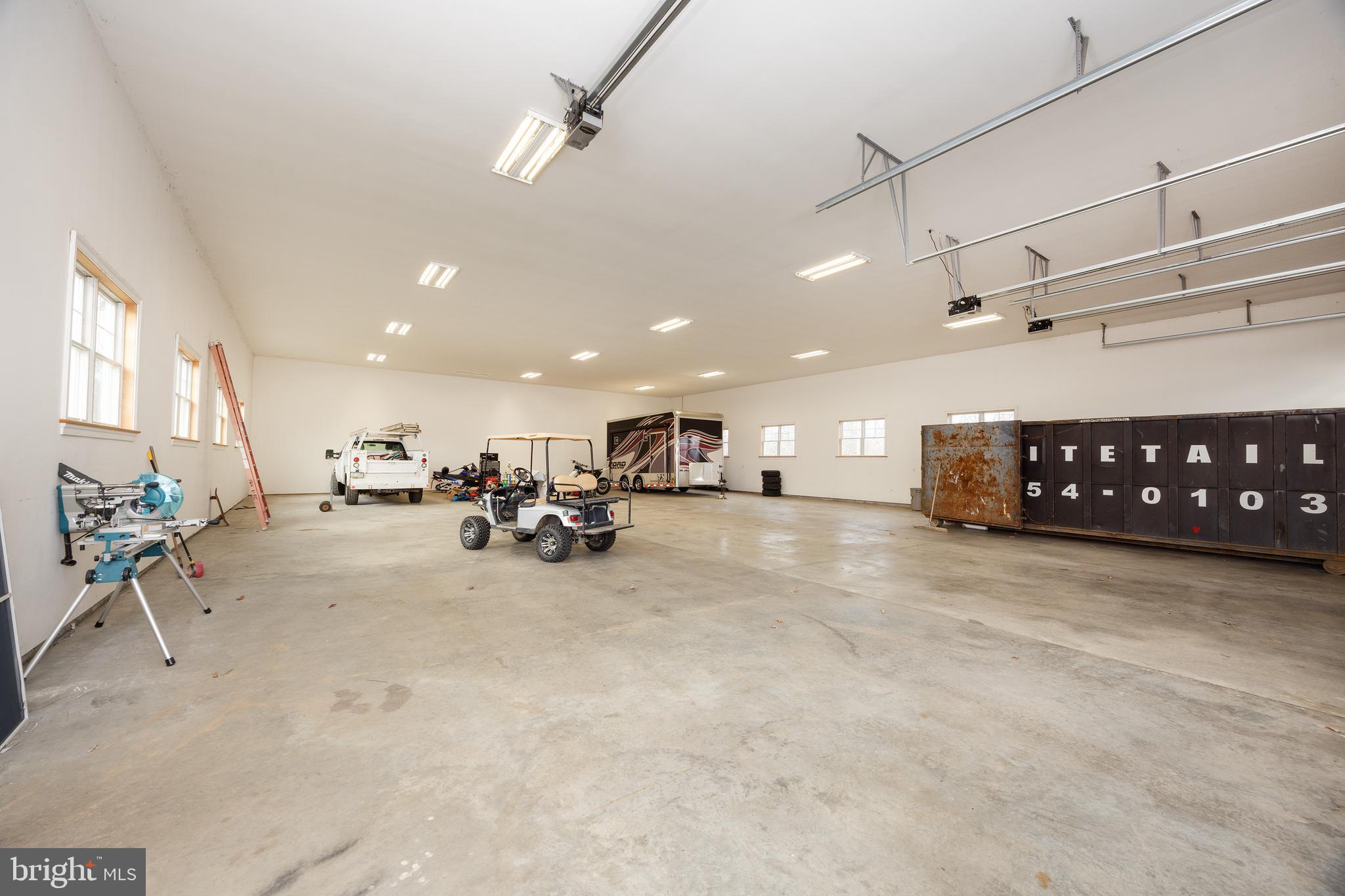 6469 Groveland Road Pipersville, PA 18947 - Photo 51 of 53 a view of a livingroom with furniture and a ceiling fan